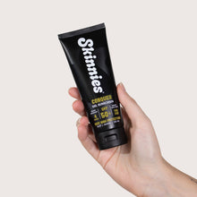 Load image into Gallery viewer, Skinnies CONQUER SPF50+ 100ml in hand