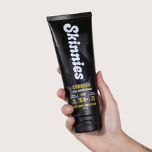 Load image into Gallery viewer, Skinnies CONQUER SPF50+ 200ml in hand